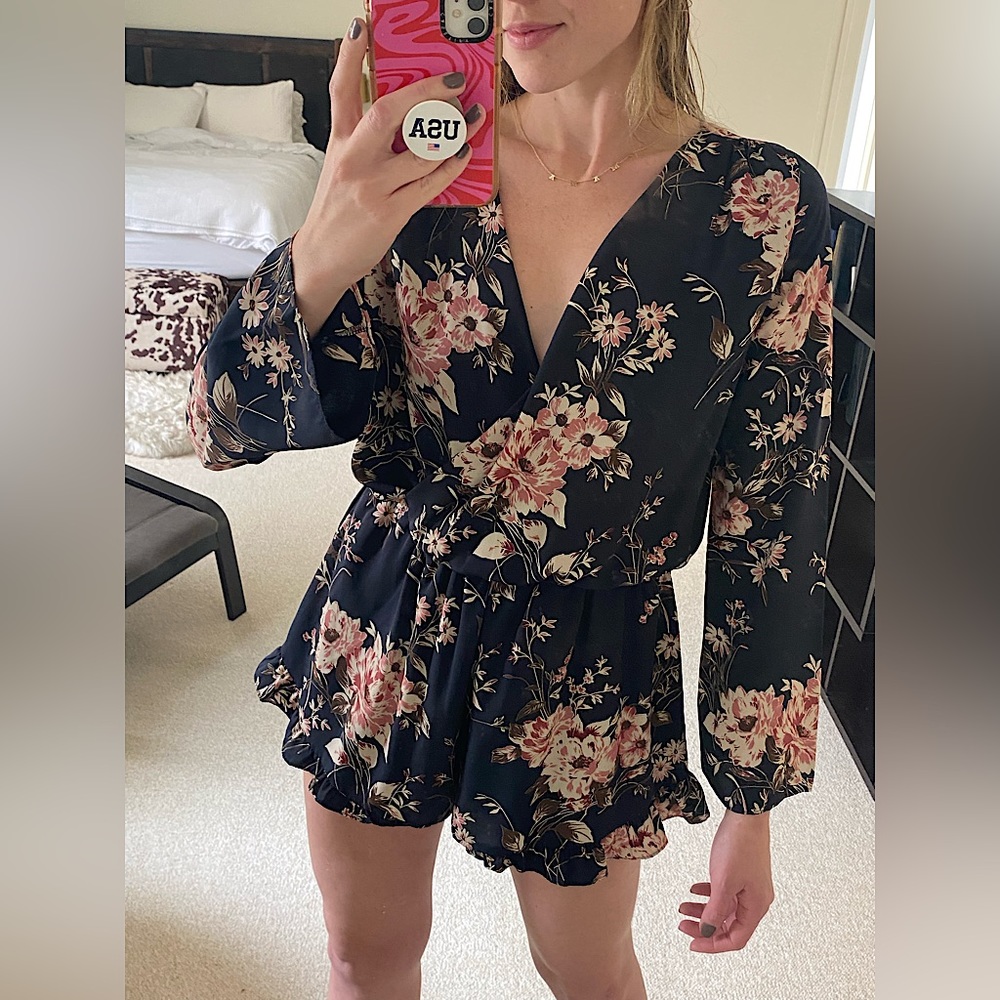 Boutique Romper size 6/8 (S/M) navy blue with light pink floral design